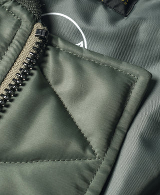 Olive MA-1 flight jacket, stitched interior panel and zipper tape detail