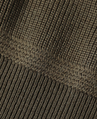 Olive textured knit sweater fabric with raised ribbed pattern