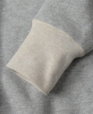 Gray sweatshirt sleeve cuff ribbing close-up