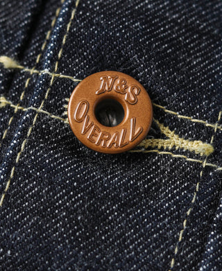 Round brown N&S Universal button on indigo selvedge denim with contrast thread