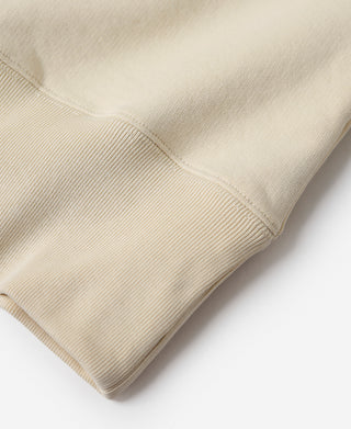 Apricot sweatshirt cuff and hem ribbing detail