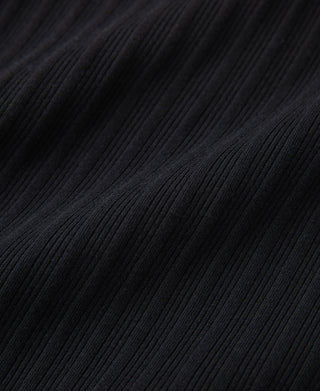 Black ribbed knit t-shirt fabric close-up with textured vertical lines