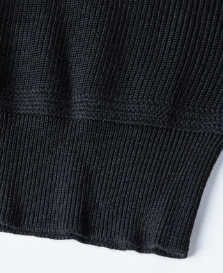 Navy knit sweater hem with ribbed cuff