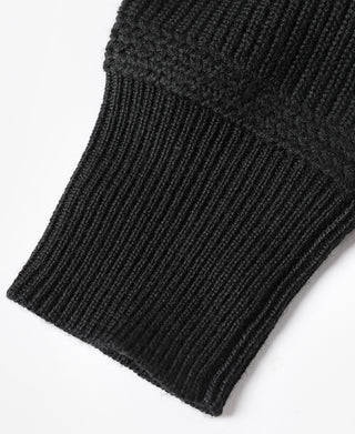 Black wool sweater ribbed cuff and sleeve hem detail
