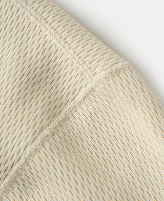 Thermal waffle-knit shirt sleeve and arm seam in light apricot/cream
