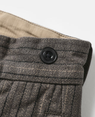 Dark gray pinstripe pants front waistband with round black button