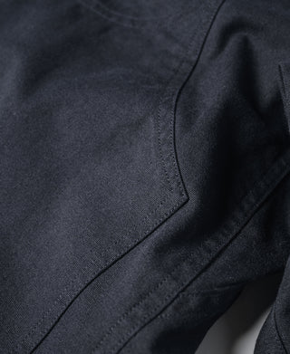 Navy cotton canvas seam and curved panel detail