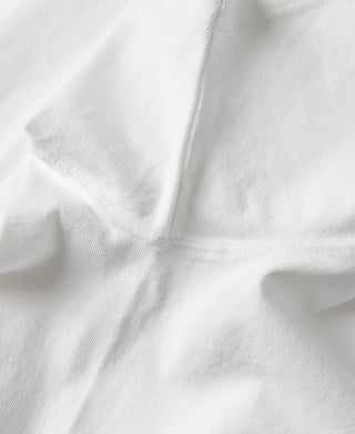 White cotton tubular T-shirt side seam and fabric detail