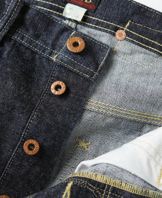 Indigo denim jeans interior with copper snaps and light gray pocket lining