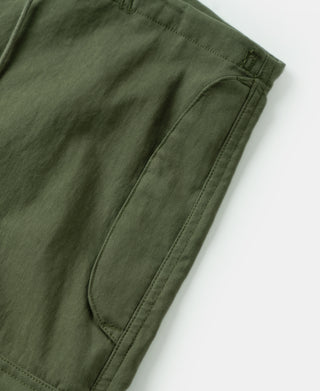 Olive knee-to-hem patch pocket with stitched seams; utility trouser construction