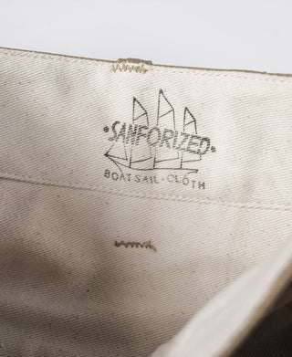 Khaki officer trousers interior waistband label with USMC-style emblem