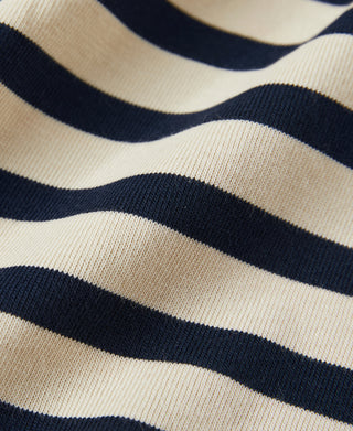Apricot and navy horizontal stripe knit fabric close-up