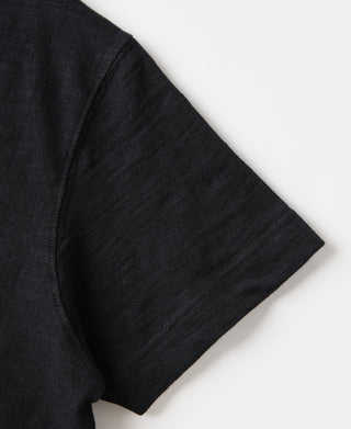 Black T-shirt sleeve hem detail with stitched edge