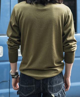 Olive long-sleeve wool henley shirt on model, back view