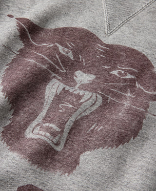 Close-up of gray sweater front with maroon bull head graphic