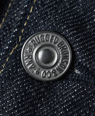 Indigo denim jacket button with engraved branding