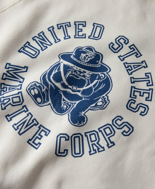 White raglan sweatshirt front with blue circular "UNIFIED CORPS" lettering