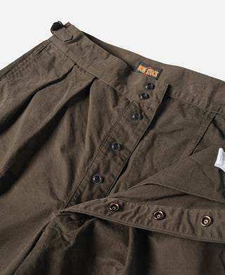 Dark brown combat pants front with button placket and pocket flap details