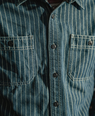 Indigo Wabash work shirt detail of front buttons and two flap chest pockets.