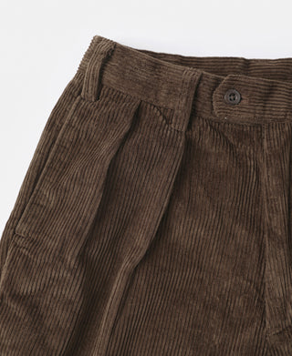 Brown corduroy trousers with belt loops, button closure, and pleated front
