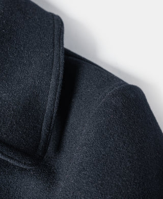 Navy peacoat shoulder and sleeve seam close-up