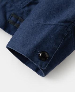 Blue moleskin Cossack jacket cuff with snap button