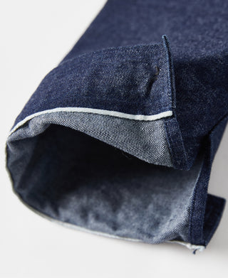 Indigo dungaree pullover jumper cuff close-up with contrast inner lining