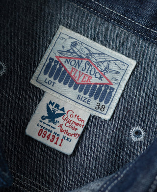 Indigo denim interior neck label with brand and size information