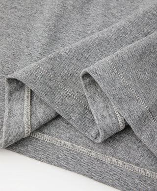 Gray athletic t-shirt close-up of stitched hem and neckline seam detail