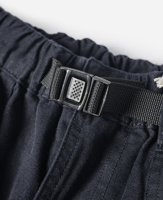 Navy cotton canvas climbing pants waistband with metal buckle and elastic back