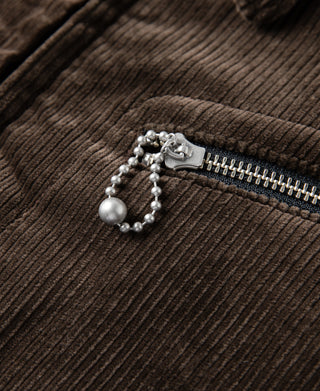 Brown corduroy cossack jacket zipper pull with bead chain on the front