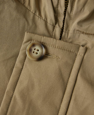 Khaki polar down parka front close-up with buttoned flap and seam stitching