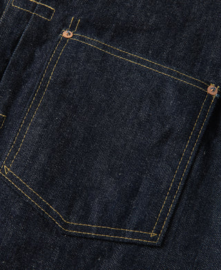 Indigo denim jacket chest pocket with stitched border and metal rivets