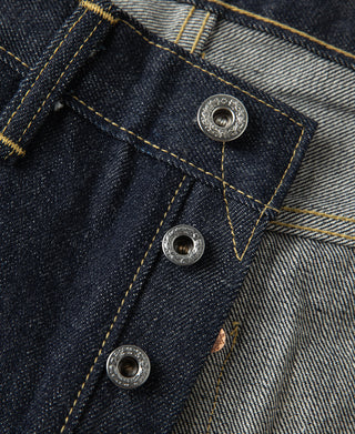 Indigo denim jeans pocket and belt loop hardware with metal rivets
