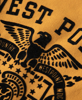 Yellow raglan sweatshirt logo close-up with eagle graphic and West Point letters
