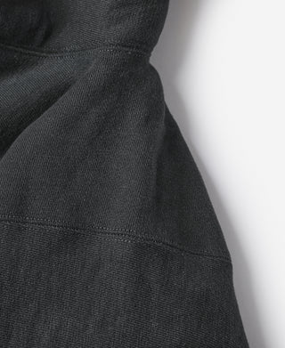 Black hoodie sleeve and hem stitching detail
