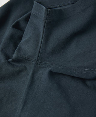 Dark vintage cotton T-shirt, neckline seam and shoulder stitching close-up
