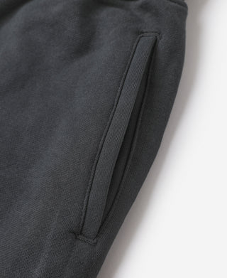 Black heavyweight terry sweatpants with side seam and stitched panel
