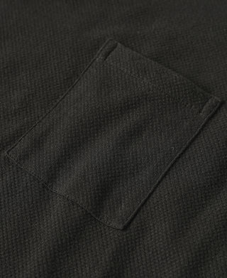 Black waffle-knit chest pocket with rectangular pocket opening