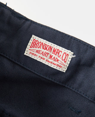Navy utility shorts with Bronson Mfg.Co fabric label on waistband