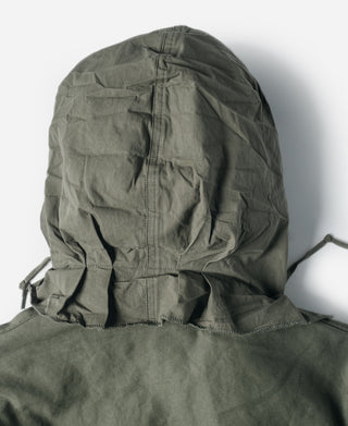 Olive field jacket inner hood lining and drawcord at the neckline.