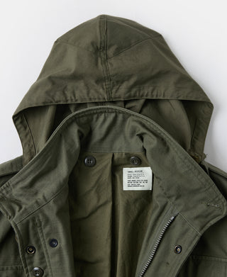 Olive field jacket hood lining with snap buttons and small size label