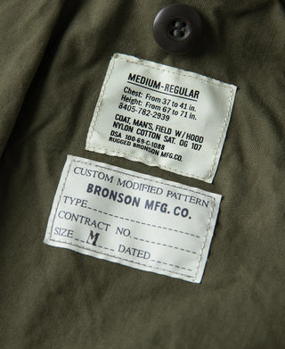 Camo field jacket size label and care tag inside collar
