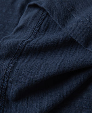 Indigo t-shirt fabric close-up with visible knit texture