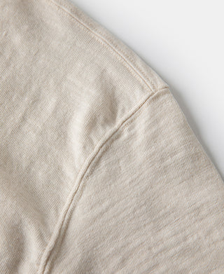 Loopwheel henley t-shirt side seam and curved shoulder seam in apricot-beige
