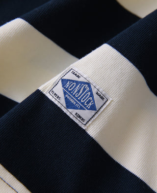 Heavyweight cotton t-shirt interior label at chest on navy and white stripes