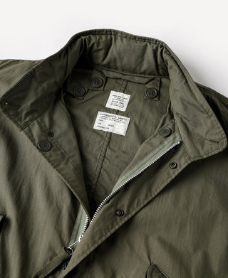 Olive parka lining with collar and buttons; interior labels; front zipper