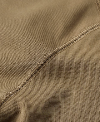 Khaki henley side seam with textured knit and stitched edging