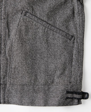 Salt & pepper cossack jacket hem close-up with pocket and adjustable buckle tab