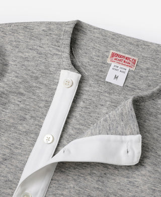 Gray heather henley shirt with white side placket and round buttons